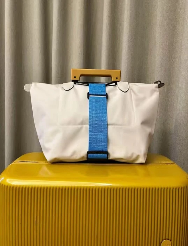 StrapMateâą | Smart elastisk bagagerem